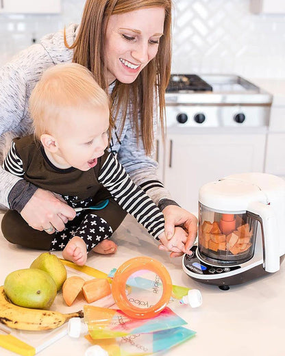 Baby Brezza Food Maker Deluxe-Automatically Steams & Blends to Perfect Consistency in 10 Minutes-Includes 3 Reusable Food Pouches & Funnels