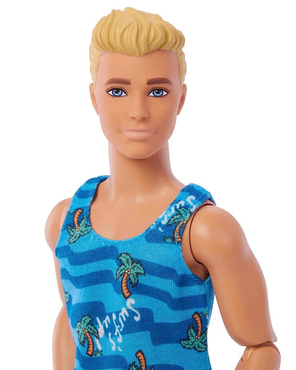 Ken Doll with Surfboard and Pet Puppy-Includes 1 Ken doll, 1 surfboard, 1 puppy figure, 1 towel and assorted accessories-Promotes Role Play-Doll & Doll Houses-36M+