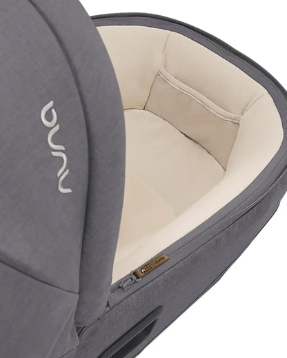 Nuna Cari NEXT Baby Carry Cot-Doubling As Car Seat & Carry Cot-3 Point Harness-With Organic Jersey Infant Insert & Dream Drape-2 Years Warranty-For 0 to 12M (Upto 13 Kg)-Granite