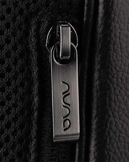 Nuna Essential Diaper Bag-Backpack-Changing Pad With Magnetic Closure-Removable Toiletry Pouch-Back Pocket Unzips Into Trolley Sleeve-Caviar