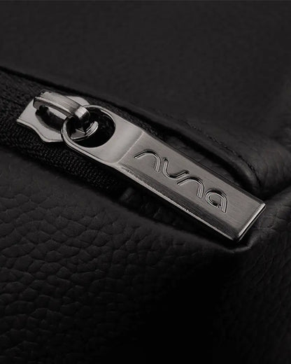 Nuna Essential Diaper Bag-Backpack-Changing Pad With Magnetic Closure-Removable Toiletry Pouch-Back Pocket Unzips Into Trolley Sleeve-Caviar