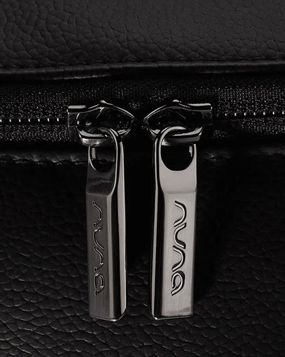 Nuna Essential Diaper Bag-Backpack-Changing Pad With Magnetic Closure-Removable Toiletry Pouch-Back Pocket Unzips Into Trolley Sleeve-Caviar