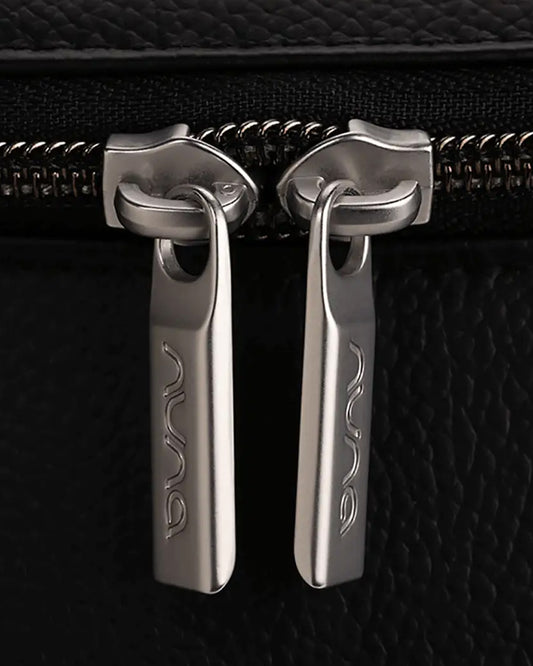 Nuna Essential BMW Collection Diaper Bag-Backpack-Changing Pad With Magnetic Closure-Removable Toiletry Pouch-Back Pocket Unzips Into Trolley Sleeve-Element