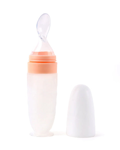 Kicks & Crawl Baby Squeeze Bottle Feeder-BPA Free-100% Food-Grade Silicone-0–100 ml-With Spoon Feeder Tip-Peach