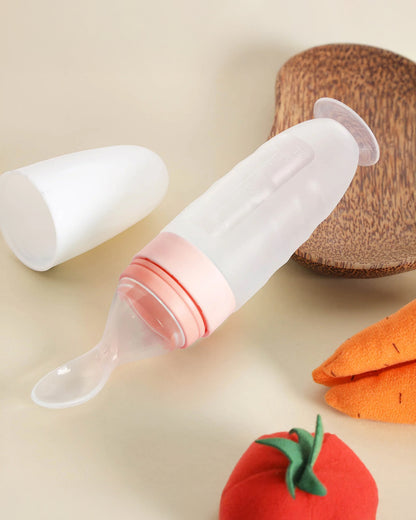 Kicks & Crawl Baby Squeeze Bottle Feeder-BPA Free-100% Food-Grade Silicone-0–100 ml-With Spoon Feeder Tip-Peach