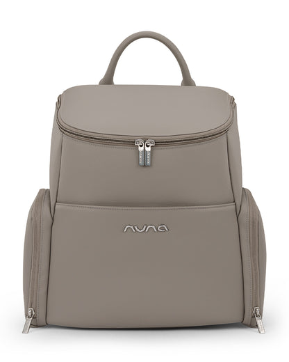 Nuna Essential Diaper Bag-Backpack-Changing Pad With Magnetic Closure-Removable Toiletry Pouch-Back Pocket Unzips Into Trolley Sleeve-Taupe