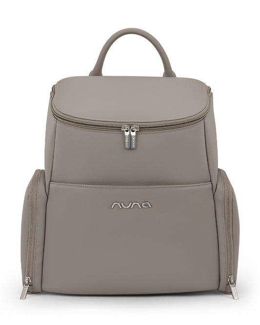 Nuna Essential Diaper Bag-Backpack-Changing Pad With Magnetic Closure-Removable Toiletry Pouch-Back Pocket Unzips Into Trolley Sleeve-Taupe