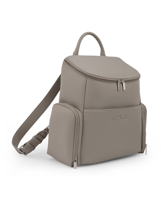 Nuna Essential Diaper Bag-Backpack-Changing Pad With Magnetic Closure-Removable Toiletry Pouch-Back Pocket Unzips Into Trolley Sleeve-Taupe