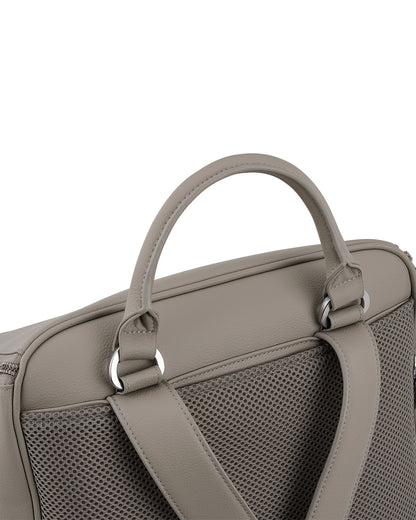 Nuna Essential Diaper Bag-Backpack-Changing Pad With Magnetic Closure-Removable Toiletry Pouch-Back Pocket Unzips Into Trolley Sleeve-Taupe