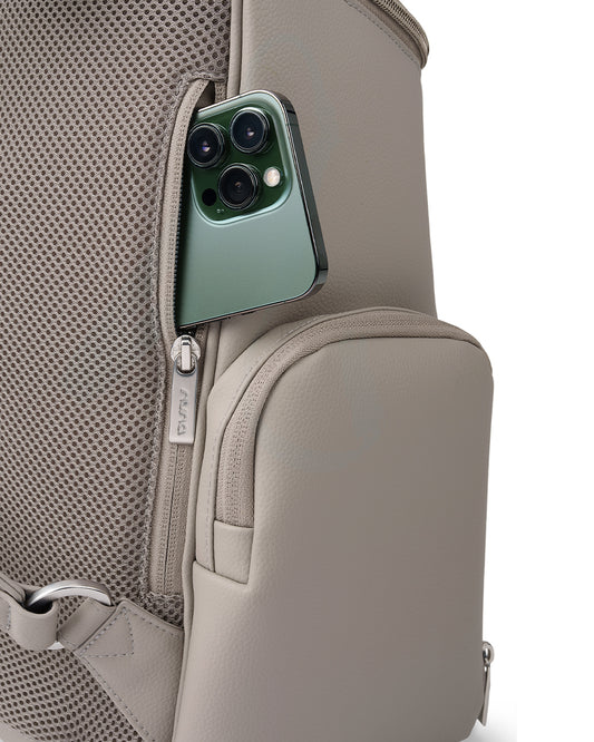 Nuna Essential Diaper Bag-Backpack-Changing Pad With Magnetic Closure-Removable Toiletry Pouch-Back Pocket Unzips Into Trolley Sleeve-Taupe