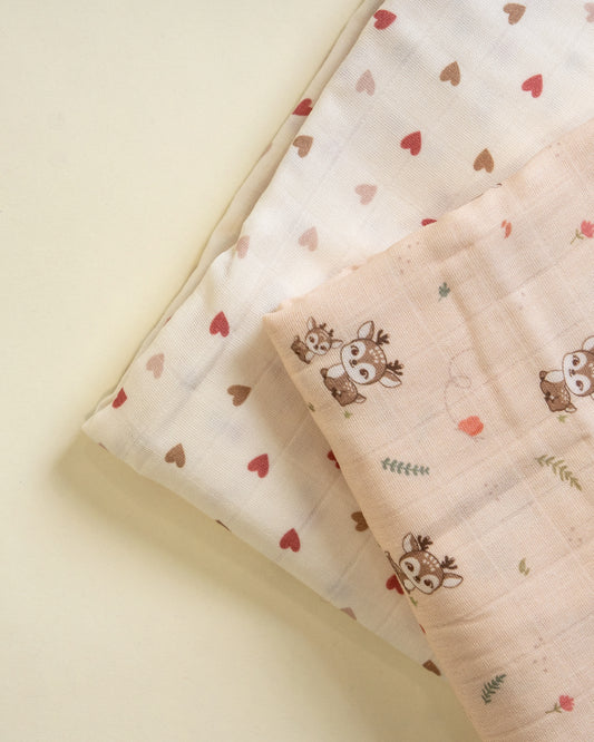 Twingle 100% Organic Muslin Swaddles-Bigger than Standard Swaddles-Supports Natural Airflow-Soft Gentle Edges-Mama Deer & Tiny Hearts Print-White & Pink-Pack of 2-Infant Wraps
