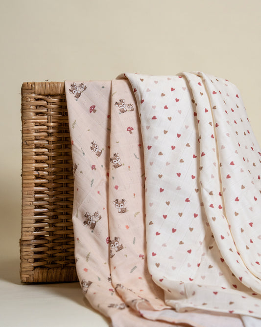Twingle 100% Organic Muslin Swaddles-Bigger than Standard Swaddles-Supports Natural Airflow-Soft Gentle Edges-Mama Deer & Tiny Hearts Print-White & Pink-Pack of 2-Infant Wraps