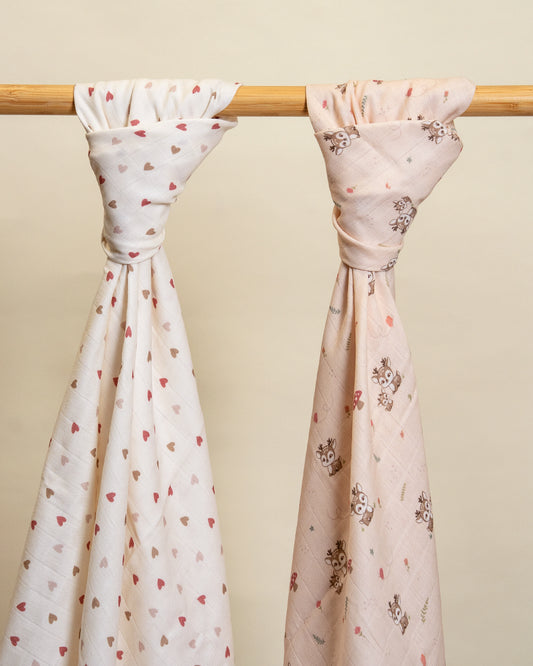 Twingle 100% Organic Muslin Swaddles-Bigger than Standard Swaddles-Supports Natural Airflow-Soft Gentle Edges-Mama Deer & Tiny Hearts Print-White & Pink-Pack of 2-Infant Wraps