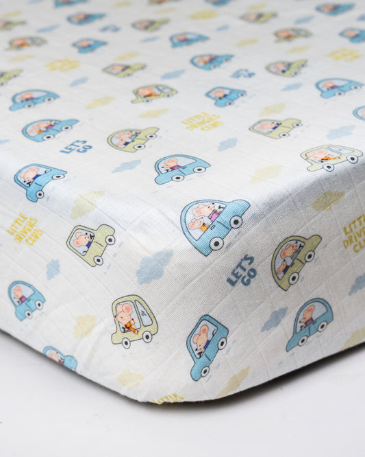 Twingle 100% Organic Muslin Fitted Cot Bedsheet-Generously Sized-Secured All-Round Elastic for Snug Fit-Softens with each Wash-Little Drivers Print-White & Blue-Pack of 1-For Infants