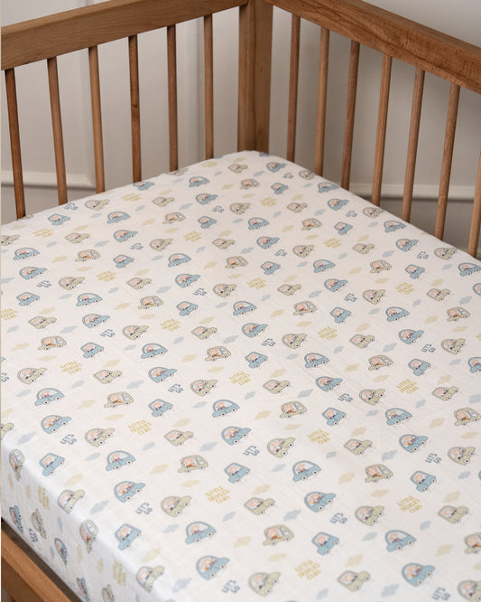 Twingle 100% Organic Muslin Fitted Cot Bedsheet-Generously Sized-Secured All-Round Elastic for Snug Fit-Softens with each Wash-Little Drivers Print-White & Blue-Pack of 1-For Infants