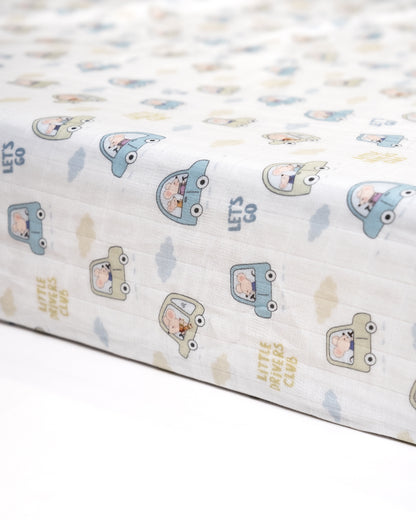 Twingle 100% Organic Muslin Fitted Cot Bedsheet-Generously Sized-Secured All-Round Elastic for Snug Fit-Softens with each Wash-Little Drivers Print-White & Blue-Pack of 1-For Infants