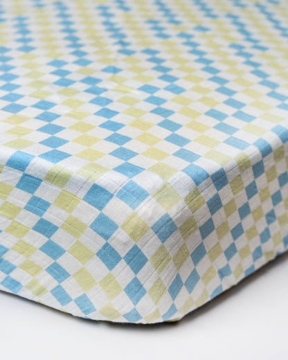 Twingle 100% Organic Muslin Fitted Cot Bedsheet-Generously Sized-Secured All-Round Elastic for Snug Fit-Softens with each Wash-Checkered Chaos Print-White & Blue-Pack of 1-For Infants
