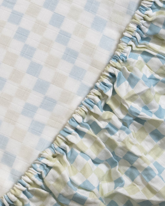 Twingle 100% Organic Muslin Fitted Cot Bedsheet-Generously Sized-Secured All-Round Elastic for Snug Fit-Softens with each Wash-Checkered Chaos Print-White & Blue-Pack of 1-For Infants