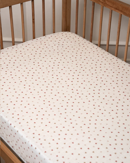 Twingle 100% Organic Muslin Fitted Cot Bedsheet-Generously Sized-Secured All-Round Elastic for Snug Fit-Softens with each Wash-Tiny Hearts Print-White-Pack of 1-For Infants