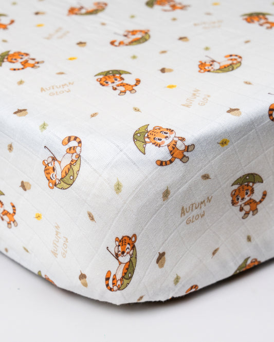 Twingle 100% Organic Muslin Fitted Cot Bedsheet-Generously Sized-Secured All-Round Elastic for Snug Fit-Softens with each Wash-Cozy Roars Print-White-Pack of 1-For Infants