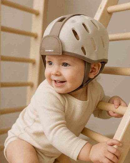 Dooky Baby Safety Helmet-With Adjustable Velcro Strap-Ventilation Holes For Added Comfort-Absorbs Impacts & Helps Prevent Bumps-For Indoor Use & Slippery Floors-For 6 to 24M-Beige