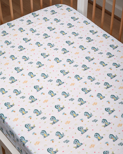 Twingle 100% Organic Muslin Fitted Cot Bedsheet-Dino Dare-Generously Sized-Secured All-Round Elastic for Snug Fit-Softens with each Wash-White-Pack of 1-For Infants