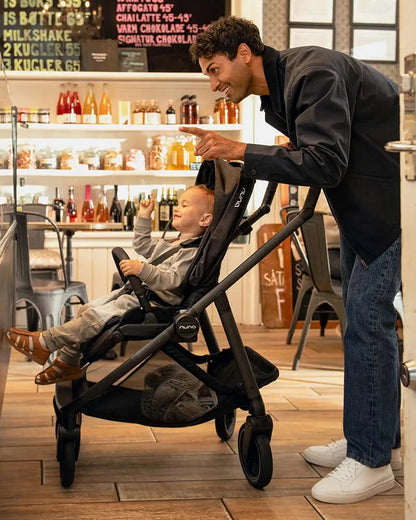 Nuna Swiv Baby Stroller-All Wheel 360 Degree Rotation-3 Positions Adjustable Parent Handle Bar-One Hand Fold-Travel System Compatible-Includes Rain Cover, Travel bag, Cup Holder & Post Adaptors-2 Years Warranty-For 0 to 4Y (Upto 22 Kg)-Caviar