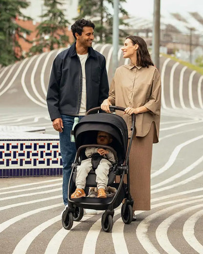 Nuna Swiv Baby Stroller-All Wheel 360 Degree Rotation-3 Positions Adjustable Parent Handle Bar-One Hand Fold-Travel System Compatible-Includes Rain Cover, Travel bag, Cup Holder & Post Adaptors-2 Years Warranty-For 0 to 4Y (Upto 22 Kg)-Caviar